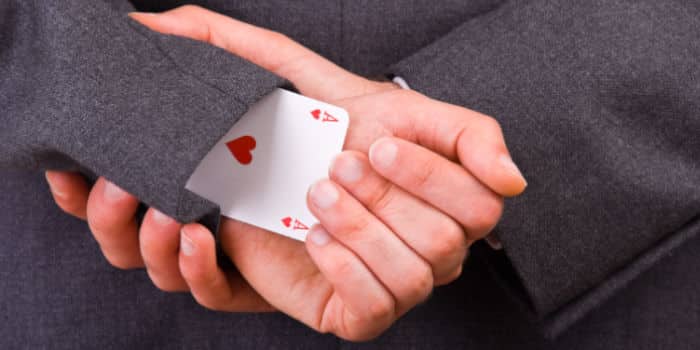 news-businessman-holding-ace-under-sleeve.jpeg